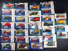 Corgi, LLedo and others - 32 boxed diecast model vehicles.