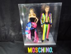 Barbie by Mattel - Moschino Barbie doll gift set Gold Label Collection model #DRW81, 1 of 4300 made.