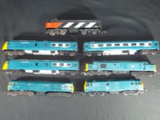 Hornby & Tri-ang - OO gauge Four diesel locomotives and a Blue Pullman DMU all unboxed,