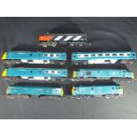 Hornby & Tri-ang - OO gauge Four diesel locomotives and a Blue Pullman DMU all unboxed,
