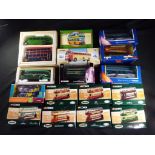 Corgi - 16 boxed diecast model buses and trams by Corgi.