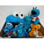 Sesame Street - a collection of eleven cookie monsters, including Tyco Walk and Talk,