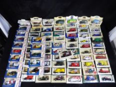 Lledo - Approximately 80 diecast model vehicles in original window boxes by Lledo.