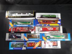 Corgi, Sunnyside and other - 12 boxed diecast model vehicles in various scales.