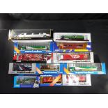 Corgi, Sunnyside and other - 12 boxed diecast model vehicles in various scales.