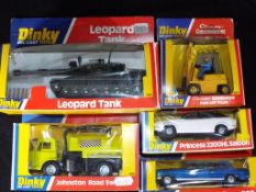 Dinky Toys - Five diecast model vehicles by Dinky Toys in original boxes.