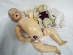 British National Doll composite Boy doll with sleeping eyes, open mouth, jointed arms and legs,