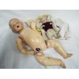 British National Doll composite Boy doll with sleeping eyes, open mouth, jointed arms and legs,