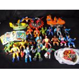 A quantity of predominantly He - Man Masters of the Universe vintage vehicles,