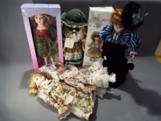 A collection of six contemporary porcelain faced collector dolls to include Leonardo and Kensington.