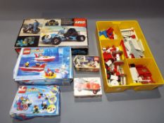 Lego - a quantity of boxed and loose Lego kits to include 854, 6429, 6326, 610 and 988,