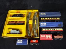 Hornby - A Hornby Dublo train set # G16 Tank Goods Set (lacking box lid) and four pieces of Hornby