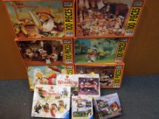 Wombles - a quantity of jigsaw puzzles featuring The Wombles to include six 100-piece jigsaws by