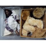 A collection of Approximately 12 dolls and teddy bears in various sizes.