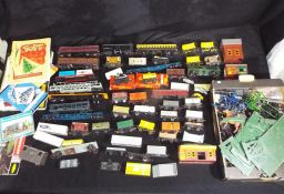 Hornby and others - A large quantity of predominately unboxed rolling stock including freight,