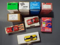 Diecast Models - a quantity of scale model kits, some already constructed,