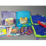 Vtech Smart Book and Elite Pad Learning System in original cases with games,