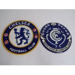 Two cast iron wall plaques advertising football teams This lot must be paid for and collected (or