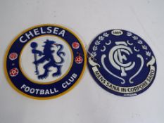 Two cast iron wall plaques advertising football teams This lot must be paid for and collected (or