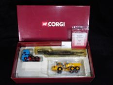 Corgi - A boxed Corgi CC13242 DAF XF Super Space Cab Nooteboom Step fram Trailer & Volvo