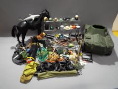 Vintage Hasbro Action Man - a huge collection of Action Man accessories to include helmets, rifles,