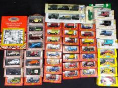 A quantity of boxed diecast model vehicles to include Cameo Village Collection,