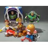 Toy Story - a quantity of Toy Story characters to include Buzz Lightyear, Jessie,