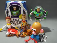 Toy Story - a quantity of Toy Story characters to include Buzz Lightyear, Jessie,