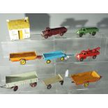 Dinky - Eight unboxed diecast models by Dinky to include # 412, # 320, # 428, # 30e and similar,
