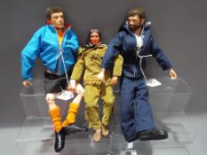 Hasbro Action Man - a collection of two Fuzzy Haired Action Men, part dressed,