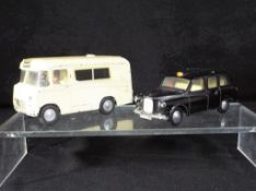 Spot-On - Two unboxed diecast model vehicles by Spot-On.