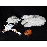 Star Wars - A collection of unboxed Star Wars vehicles including the Millennium Falcon,