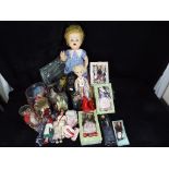 A collection of three mid-century dolls to include a black Marie-Mia doll approximately 5 cm (h),