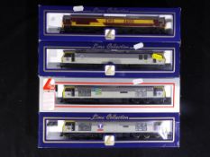 Model Railways - four Lima OO gauge diesel locomotives to include 204679 CL66 EWS 66001,