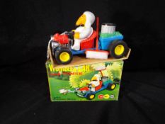 The Wombles - Marx Toys a Wombles car with Tomsk, complete in a card board storage,