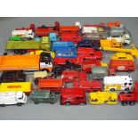 Diecast model vehicles - a mixed lot consisting of a quantity of playworn cars, trucks and vans,