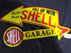 Two cast iron Shell Arrow garage signs This lot MUST be paid for and collected,