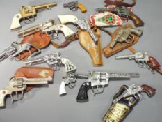 A good collection of cap guns by Crescent Toys,