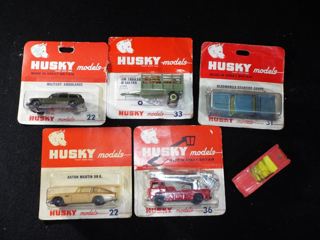 Husky Models - Five carded and one loose Husky Models 1:64 scale diecast model vehicles.