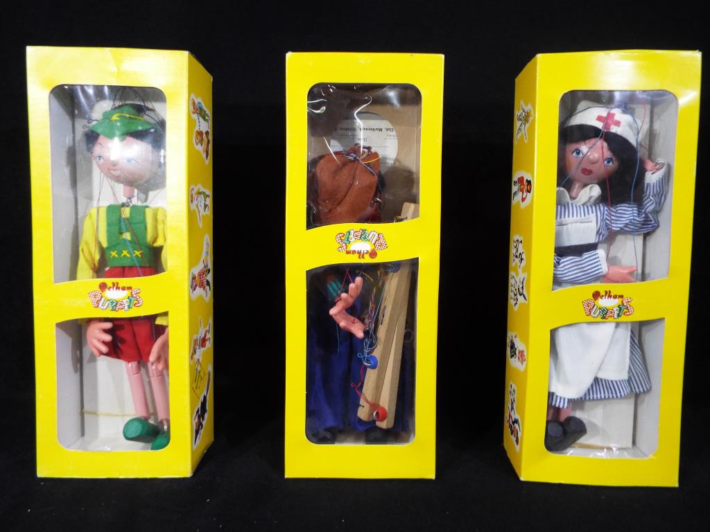 Pelham Puppets - three boxed puppets comprising Nurse, Cowboy and Tyolean Boy,