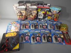 A quantity of boxed Star Trek action figures,