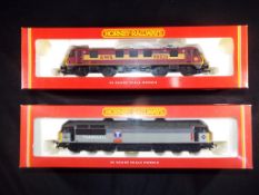 Hornby - Two boxed OO gauge diesel and electric locomotives by Hornby.