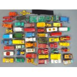 Diecast model vehicles - a mixed lot consisting of a quantity of playworn cars, trucks and vans,