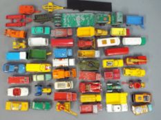 Diecast model vehicles - a mixed lot consisting of a quantity of playworn cars, trucks and vans,