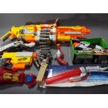 A lot comprising a quantity of Nerf and Banzai power blasters