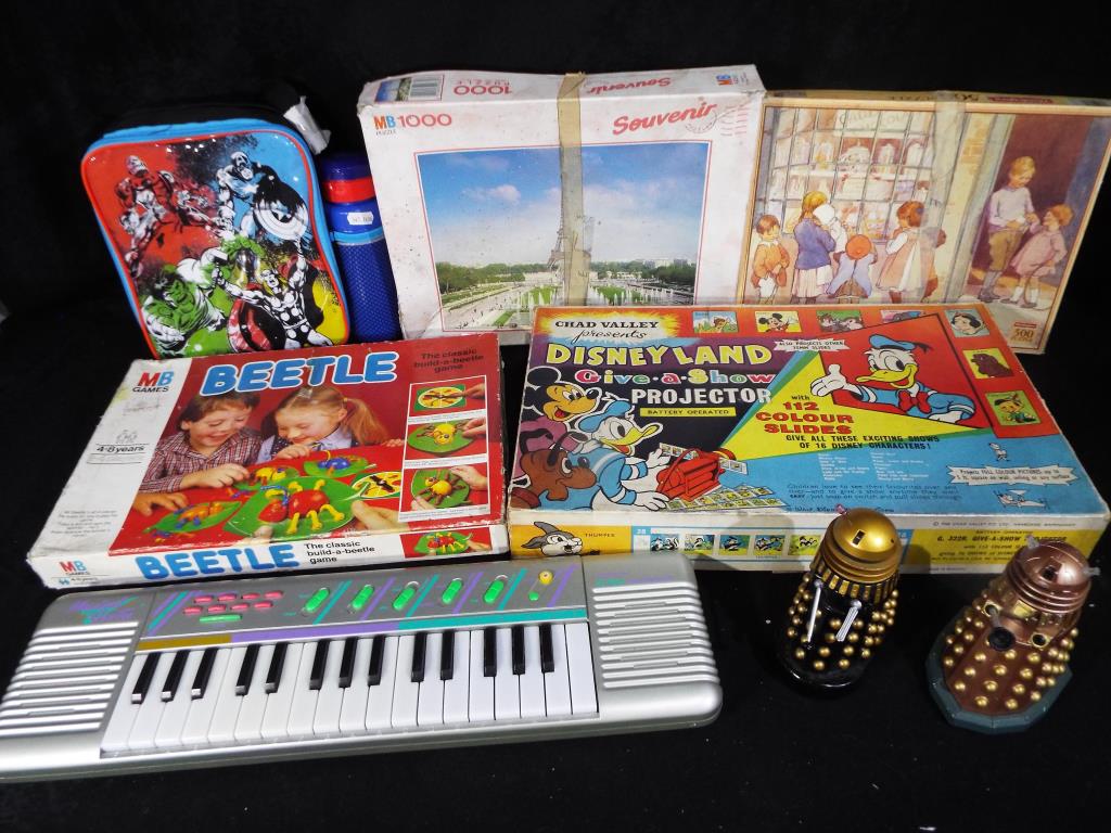 A mixed box of toys and games