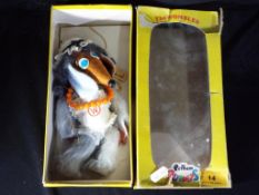 Pelham Puppets - the Wombles a boxed Pelham puppet of Wellington Womble dated 1973 with six control
