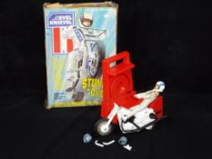 Ideal - A boxed Ideal Evil Knievel Stunt Cycle with Gyro Powered Motor.