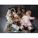 A good collection to include a large collection of international souvenir dress dolls,