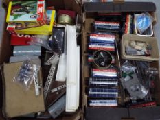 Two boxes containing a quantity of model railway items comprising, N gauge scenics, OO gauge track,